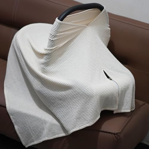 Portable Bewdio nursing cover folded inside a diaper bag