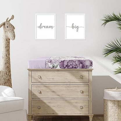 Close up of watercolor floral pattern on nursery changing pad cover