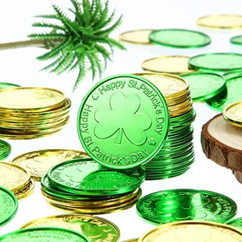 Two hundred pieces of green and gold holiday tokens laid out in an even distribution.