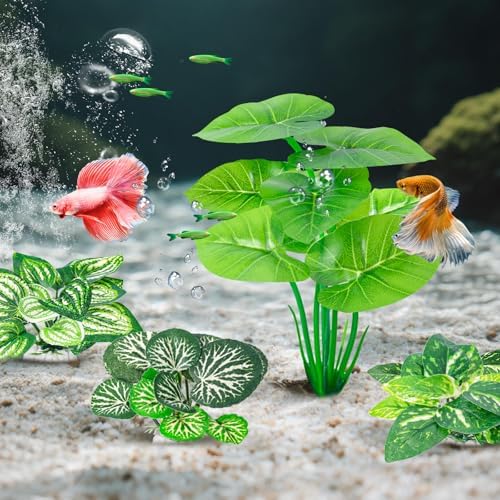 Twelve piece set of CousDUoBe silk aquarium plants arranged outside of a turtle tank.