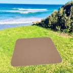 Triluby washable baby food splash mat spread over a living room carpet