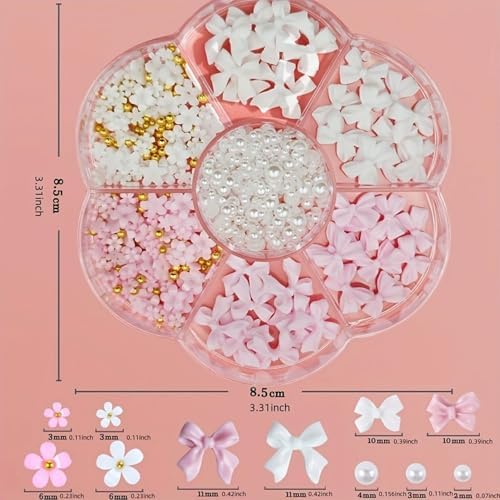 DIY nail craft supplies with bow and flower charms