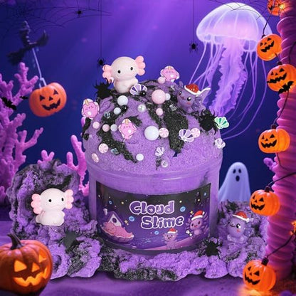 Adorable axolotl charms and purple glitter mix-ins spread out on a flat surface.