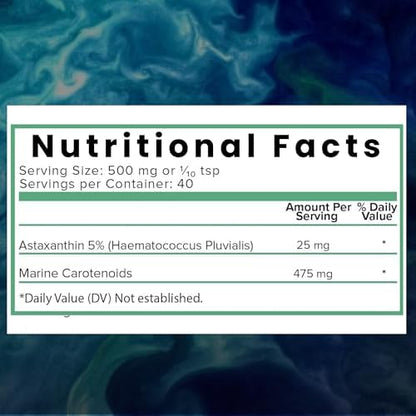 Vibrant red organic astaxanthin powder scooped out of packaging
