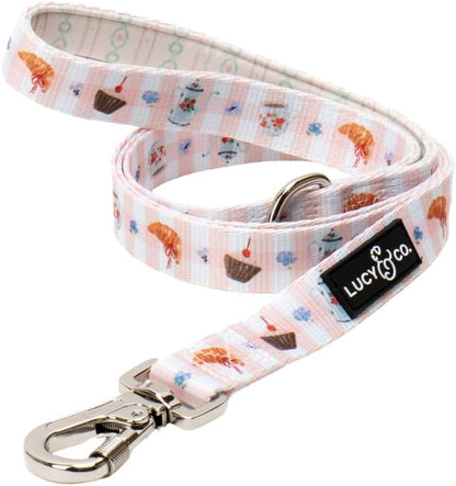 Stylish floral patterned dog lead matching reversible pet harnesses.