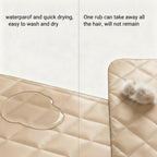 Quilted dog crate pad showing waterproof fabric texture