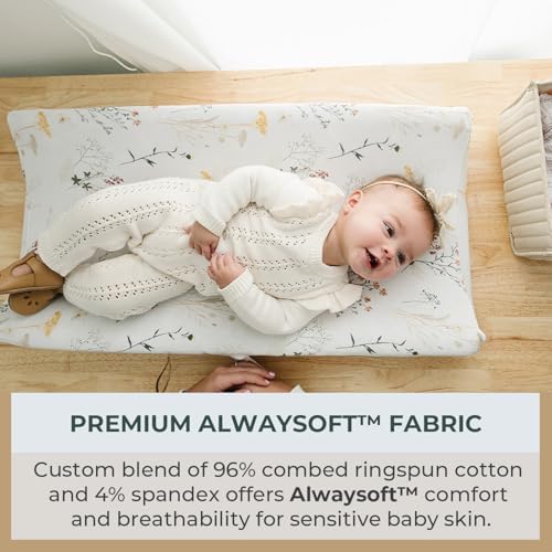 Pobibaby changing pad cover showing elastic edge and safety strap slits