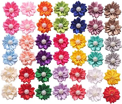 Close up view of Yaka flower dog hair bows with rubber bands