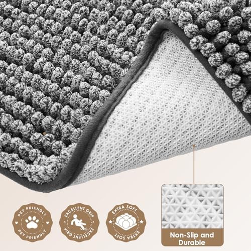 Washable dog mud mat being folded for laundry maintenance.