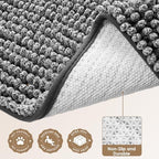 Washable dog mud mat being folded for laundry maintenance.