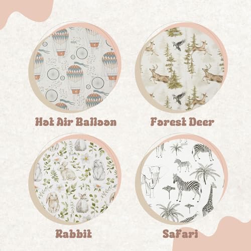 Insular washable high chair mat being wiped clean with cloth