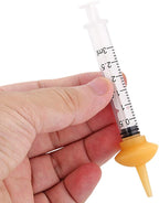 Full package contents of the Xuanda Model 1 pet feeding kit including black storage caps.