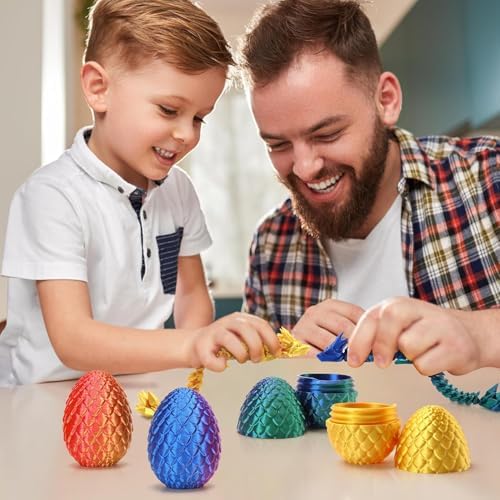 Assorted rainbow colored miniature mystery eggs sitting next to fully extended articulated dragons