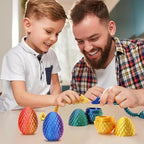 Assorted rainbow colored miniature mystery eggs sitting next to fully extended articulated dragons