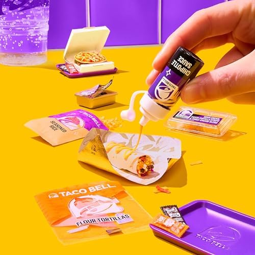 Assembling tiny ingredients using tweezers and liquid resin following the recipe card instructions.