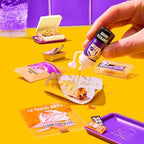 Assembling tiny ingredients using tweezers and liquid resin following the recipe card instructions.