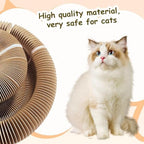 Packaging contents of the Kitty Kurlz scratcher showing the main cardboard unit, tracking ball, and catnip packet.