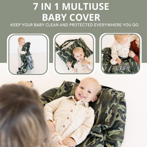 Infant sitting inside the Ash + Clyde 7 in 1 hygienic cart hammock attached to a grocery trolley