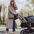 Dyomnizy portable changing station attached to a stroller