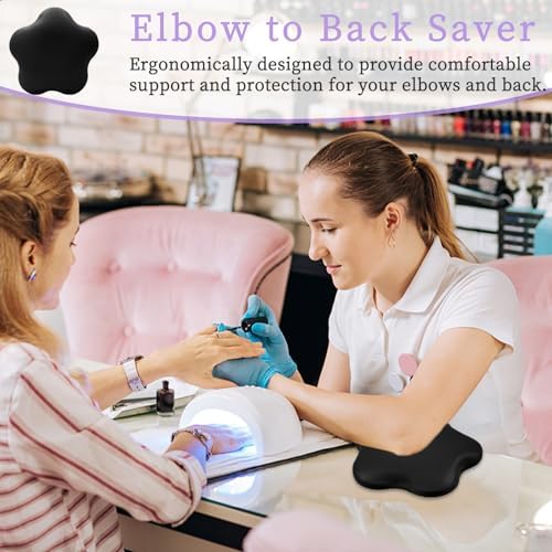 Nail technician using black Yingjee armrest for comfort
