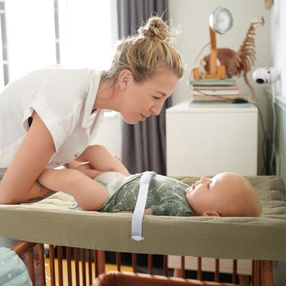 Beige neutral tone Lulumoon cotton muslin changing mat cover laid out to demonstrate its universal dimensions.