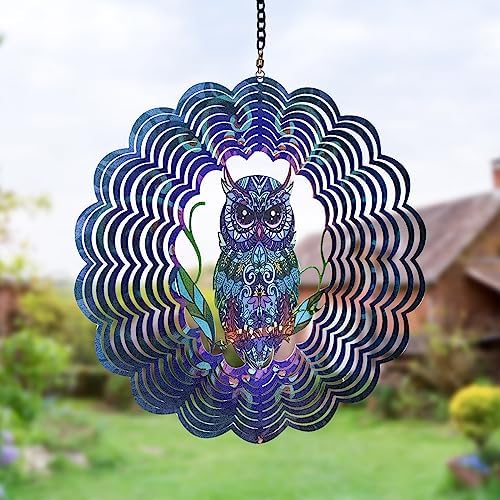 Decorative owl wind spinner hanging on outdoor patio