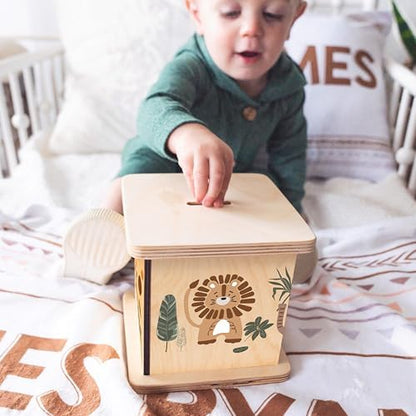 BloomOwl handmade wooden savings bank showing the functional top coin slot details