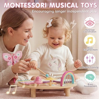 Lehoo Castle unicorn baby music station showcasing rainbow wind chimes and butterfly castanets close up.