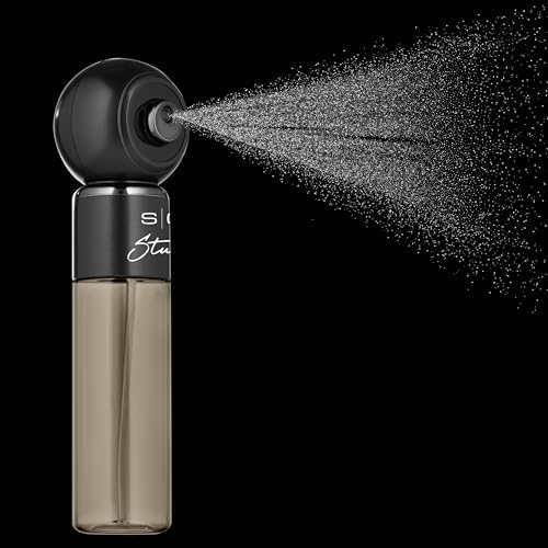 StyleCraft Mini Mister liquid reservoir being filled for professional barber use