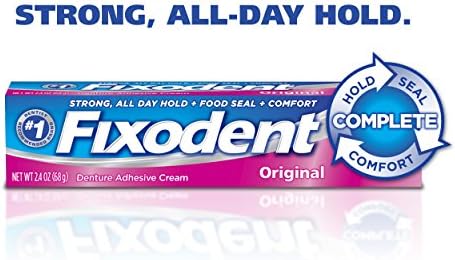 Denture adhesive cream thin strip applied to clean dry denture fitting surface