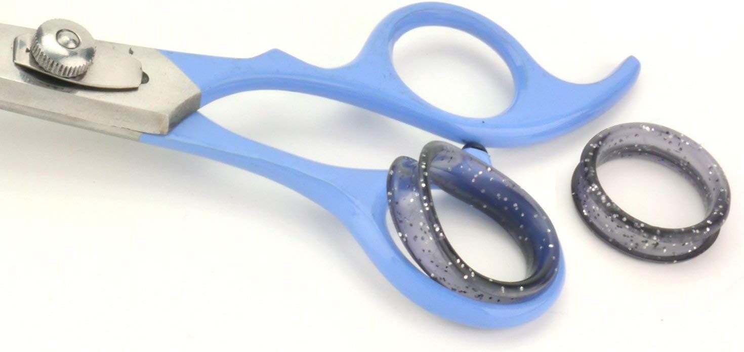 Side view of the blue right handed pet scissors highlighting the adjustable tension control screw.