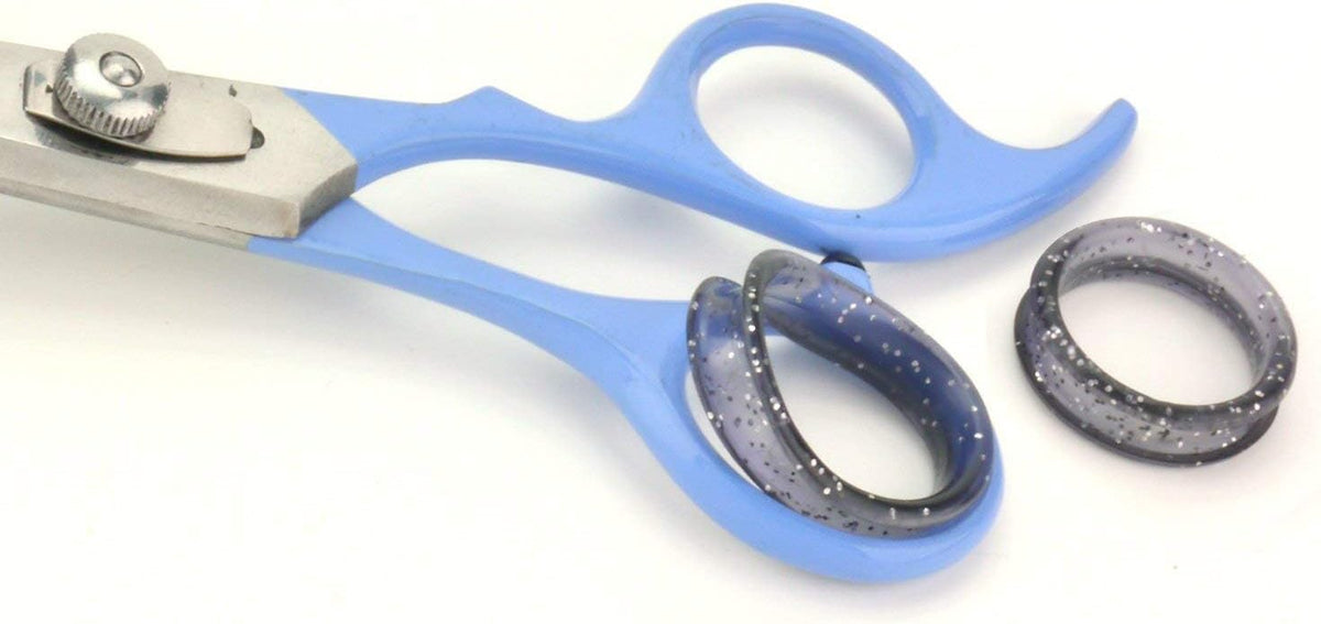 Side view of the blue right handed pet scissors highlighting the adjustable tension control screw.