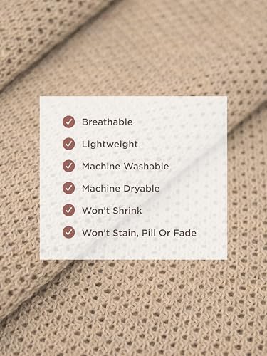 The Cocoon multi-functional nursing cover folded as a baby blanket