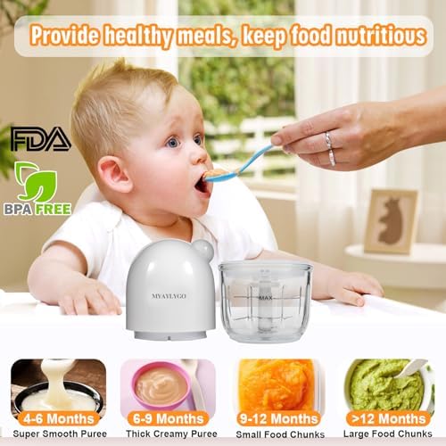 Compact glass puree machine blending fresh organic vegetables on a kitchen counter