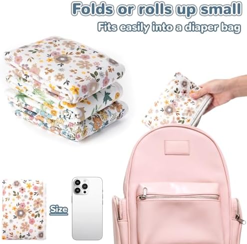 Phoebus Baby changing sheet rolled up tightly illustrating its lightweight portability for travel.