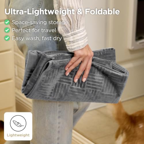Waterproof testing demonstration showing liquid beading on the Bedsure pet cover fabric.