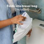 Frida Baby Fold-and-Go Portable Potty Seat for Toilet, Foldable Travel Potty Seat for Toddler, Fits Round & Oval Toilets, Non-Slip Base, Handles, Includes Free Travel Bag - Image 6
