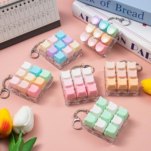 Adult holding the nine key cute keyboard decompression toy for stress relief