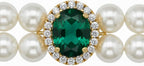Close up view of the emerald green gemstone charm and adjustable metal extension chain on the Hotlion pet necklace.