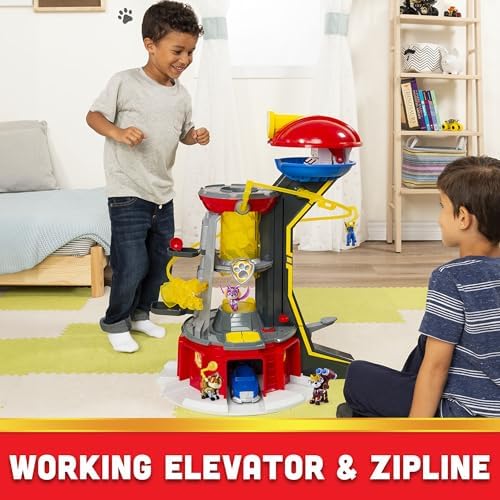 Paw Patrol Chase vehicle loaded into the rotating base launcher at the bottom of the Mighty Lookout Tower playset.