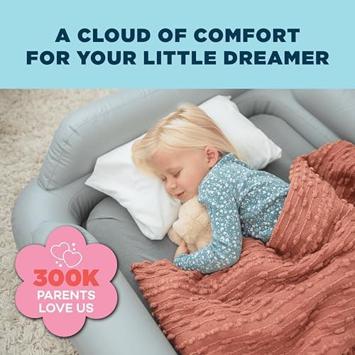 SlumberTot portable kids air mattress with integrated safety bumpers inflated in a room setting.