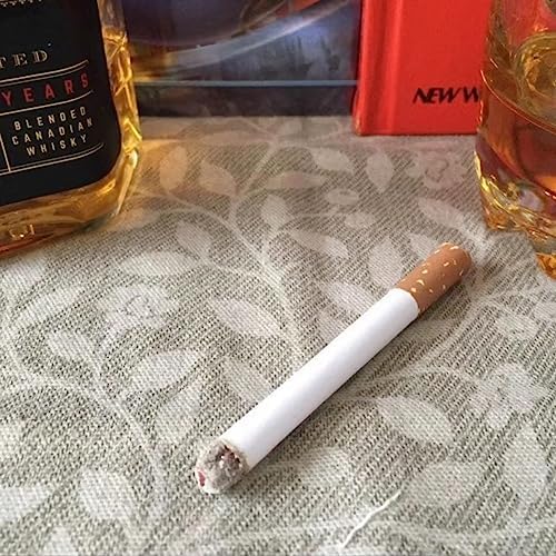 Faux cigarettes costume accessory featuring speckled brown filters