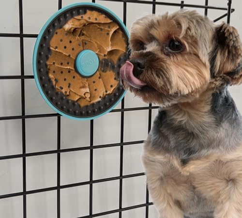 Small dog enjoying frozen Spot Dog Lick Mat
