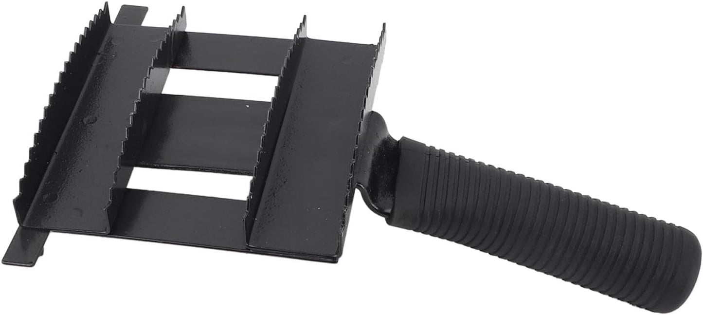 Cattle grooming comb with black non slip ribbed rubber handle close up