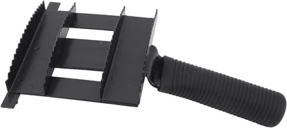 Cattle grooming comb with black non slip ribbed rubber handle close up
