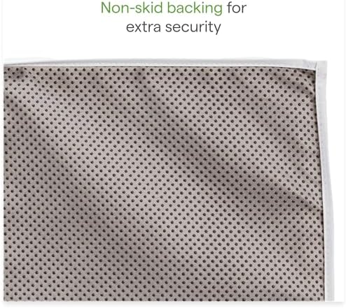 Munchkin changing pad safety buckle and contoured sides