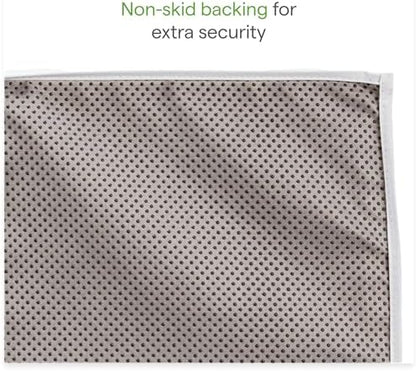 Munchkin changing pad safety buckle and contoured sides