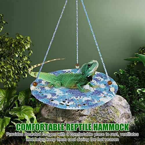 Bearded dragon resting on cotton hanging swing bed