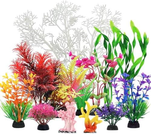 Vibrant pink and yellow artificial aquarium plants with heavy weighted base anchors