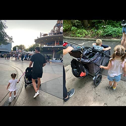 Child walking safely next to parent using Strollmate tether